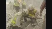 Two Hatzoloh paramedics in the aftermath of the collapse. (WDR Media Group)