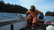 Matt Carlson secures a fishing line in hopes of catching dinner.