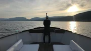 Kapitän Patrik Bucher auf dem umgebauten ehemaligen Fahrgastschiff Romandie I.