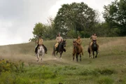 Vier amerikanische Ureinwohner zu Pferd