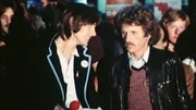 Der achte Teil der neuen, zehnteiligen Doku-Reihe zu den 70ern in NRW erzählt bewegende Geschichten von Menschen. So erlebt „Rockpalast“-Urgestein Albrecht Metzger noch einmal den Moment, als zum ersten Mal die Eurovisions Hymne ertönte und die Bühne für den „Rockpalast“ freigab. - Die Rockpalast-Moderatoren Alan Bangs (l) und Albrecht Metzger.