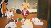 Bazire gibt den Hunden Gras zum fressen, damit diese sich übergeben können.