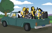 Hans Maulwurf (l.) nimmt die Band Metallica auf seinem Kleinlaster mit ...