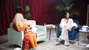 Debbie and Chantel talking and eating in the green room.