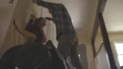Stephen Lee holding gun to Jessica Henries head. Re-cre actors