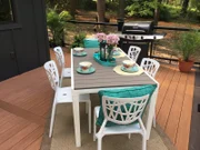 A nice table setup for Lee and Kelli's new lakefront home deck at Sunset Haven, as seen on Lakefront Bargain Hunt: Renovation.