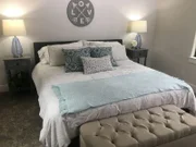 The beautiful new master bedroom in Lee and Kelli's new lake home, Sunset Haven, as seen on Lakefront Bargain Hunt: Renovation.