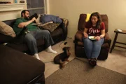 Bill and Brittani are in the living room.
