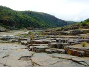 Ancient tidal flats that have 3 billion year-old bacterial mat fossils, evidence of early life that changed the atmosphere. Episode 1 - Birth.