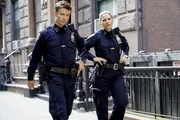L-R: Jamie Reagan (Will Estes); Eddie Janko (Vanessa Ray)