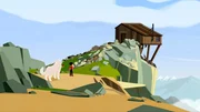 Sebastian steht vor der baufälligen Hütte, in der er geboren wurde.