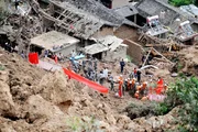 Rescuers search for survivors at the scene of the mudslide on September 3, 2010 in Baoshan, Yunnan Province of China.