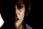 Scully (Gillian Anderson) befindet sich in der Gewalt eines bestialischen Frauenmörders ...