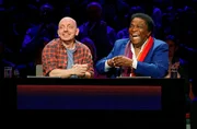 Rateteam-Kapitän Bernhard Hoëcker (l.) mit Sänger und Entertainer Roberto Blanco (r.).