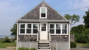 What The Deck is a cute and quaint beach cottage with great views of the water as seen on HGTV's Beachfront Bargain Hunt.