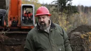 Todd with Jack behind in excavator.