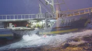 F/V Cornelia Marie, taking on a little ice, while the crew pulls in the lines of a pot.