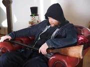Derrick waiting inside with a shotgun. Derrick waiting inside with a shotgun.