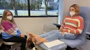 Rebecca Rhodes in Exam room with Mom