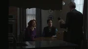 Swiski interrogates the teacher and his wife.