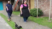 Allen and Vianey walking their dogs