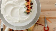Molly Yeh's Carrot Cake with Spiced Cream Cheese Frosting, as seen on Girl Meets Farm, Season 3.