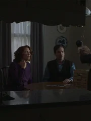 Swiski interrogates the teacher and his wife.