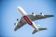 DUBAI AIRPORT, UAE - Emirates aircraft from below.