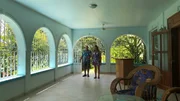 Interior, Clients David and Gina on patio of Calabash Breeze Property in Roatan, Honduras. As seen on HGTV's Caribbean life.