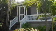 Front exterior at the Coastal Cottage house, in St. John, USVI, shown to Clients Kris Robertson and Lindsey Powell as seen on HGTV's "Caribbean Life".