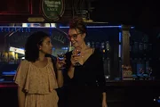Becky gets drinks for Melinda and David. Becky's boyfriend arrives.