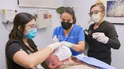 As seen on TLC’s Dr. Pimple Popper, Dr. Sandra Lee poses for the camera in various movie poster poses.