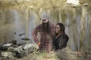 Matt Raney and Chantel Johnson are by the river.