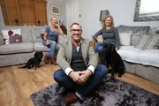 Master dog trainer Graeme Hall meets identical twins Christine and Jackie. Can he help their dogs Herman and Libby to become friends?