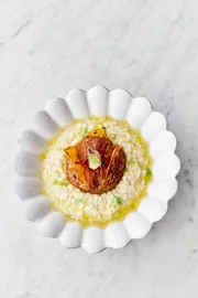Risotto mit ger&ouml;steten Tomaten.