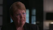 Vicki King with glasses and blonde hair during interview