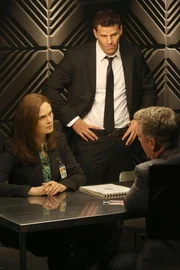 BONES: Brennan (Emily Deschanel, L) and Booth (David Boreanaz, R) question a surgeon who may have taken part in the murder of an FBI agent.
