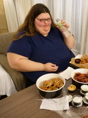 Megan eats at restaurant.