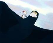 Der Gorgo lädt Nils und Krümel auf seinen Rücken. Er wird sie zu Akkas Schar zurückbringen.