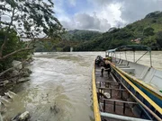 Mariana van Zeller traveling by boat while investigating the world of cocaine trafficking.