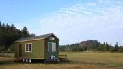 Clay Christofferson&rsquo;s tiny home fits in with the gorgeous natural scenery surrounding it here in Washington, as seen on Tiny House, Big Living.