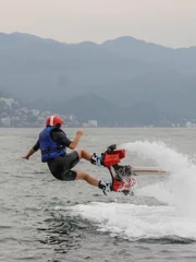 Woman on flyboard. Flyboard is a new extreme sport.
