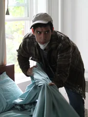Diego Pillco grabs the bed sheet with deadly intent. Diego Pillco grabs the bed sheet with deadly intent.