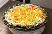 Kürbisblüten sind ein beliebter Belag für Tlayudas, ein Grundnahrungsmittel der Einwohner von Oaxaca.