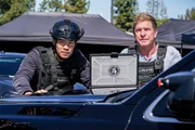 L-R: Victor Tan (David Lim), Dominique Luca (Kenny Johnson)