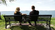Homebuyer Sandy and her son, Riley, enjoy the Boston skyline views while deciding which South Shore home is the right fit, as seen on HGTV's Beach Hunters.