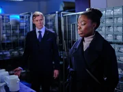 Dr Onome George (Estella Daniels, r.)