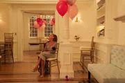 Carrie Bradshaw (Sarah Jessica Parker).