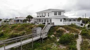 The Pelican House has a private walkway to the beach with an outdoor shower, as seen on HGTV's Beach Hunters. The Pelican House has a private walkway to the beach with an outdoor shower, as seen on HGTV's Beach Hunters.