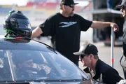 Tim Huddleston of High Point Racing coaches Brad as he takes his first laps during practice.
